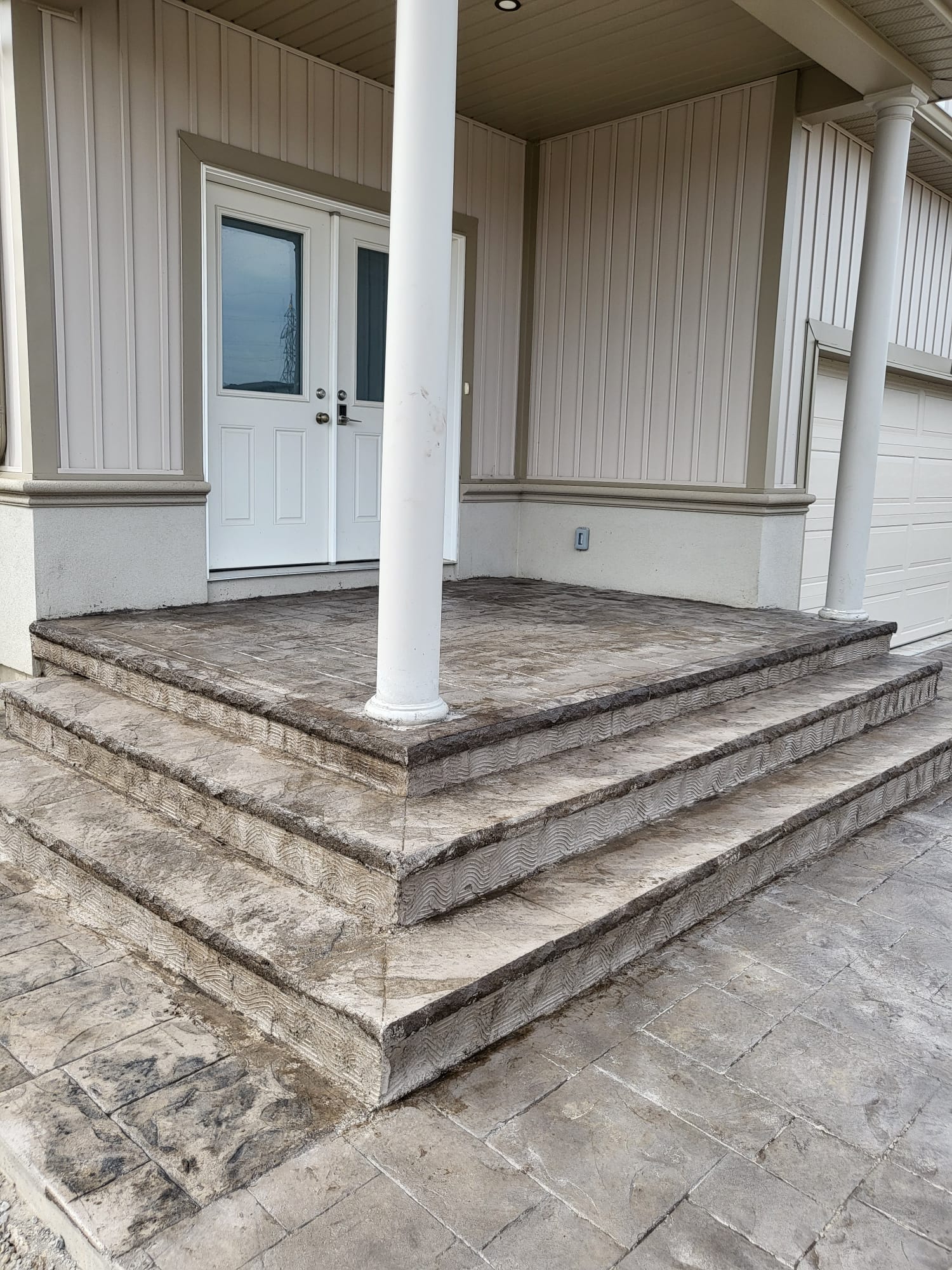 Stamped concrete front entrance and steps Burlington