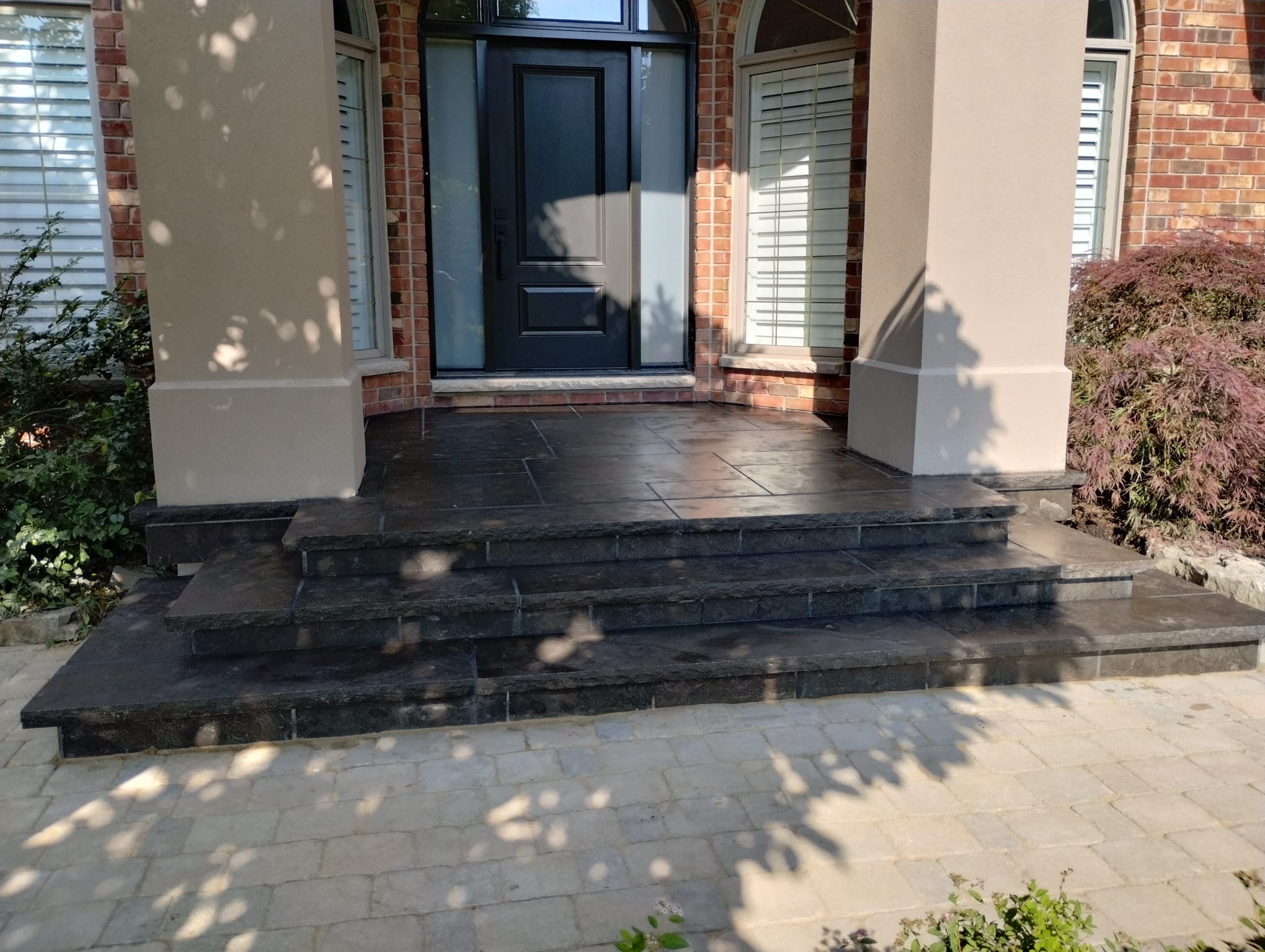 Unilock front entrance and steps Oakville paver landing