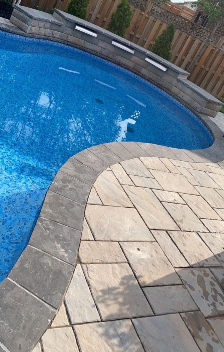 Flagstone pool coping installation Burlington