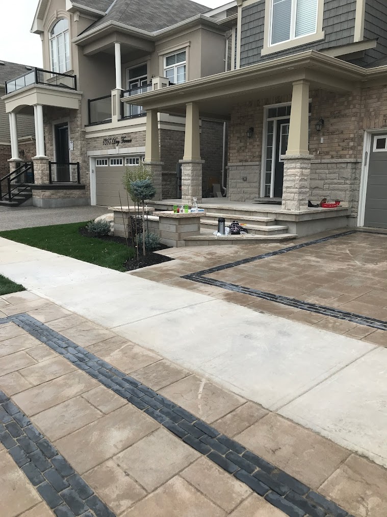 Multi-level segmental retaining wall and stone steps Dundas