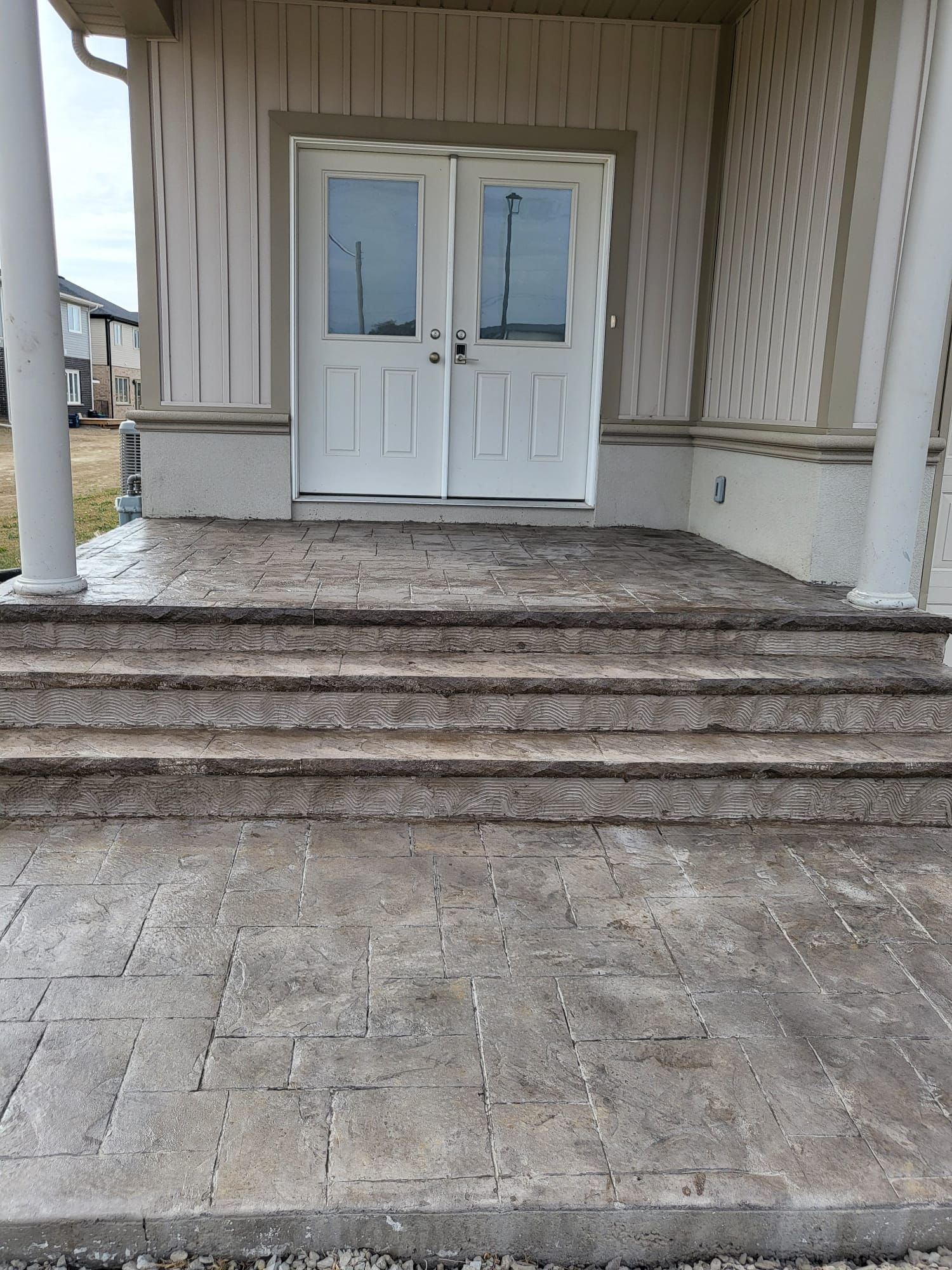 Exposed aggregate front steps and walkway Ancaster